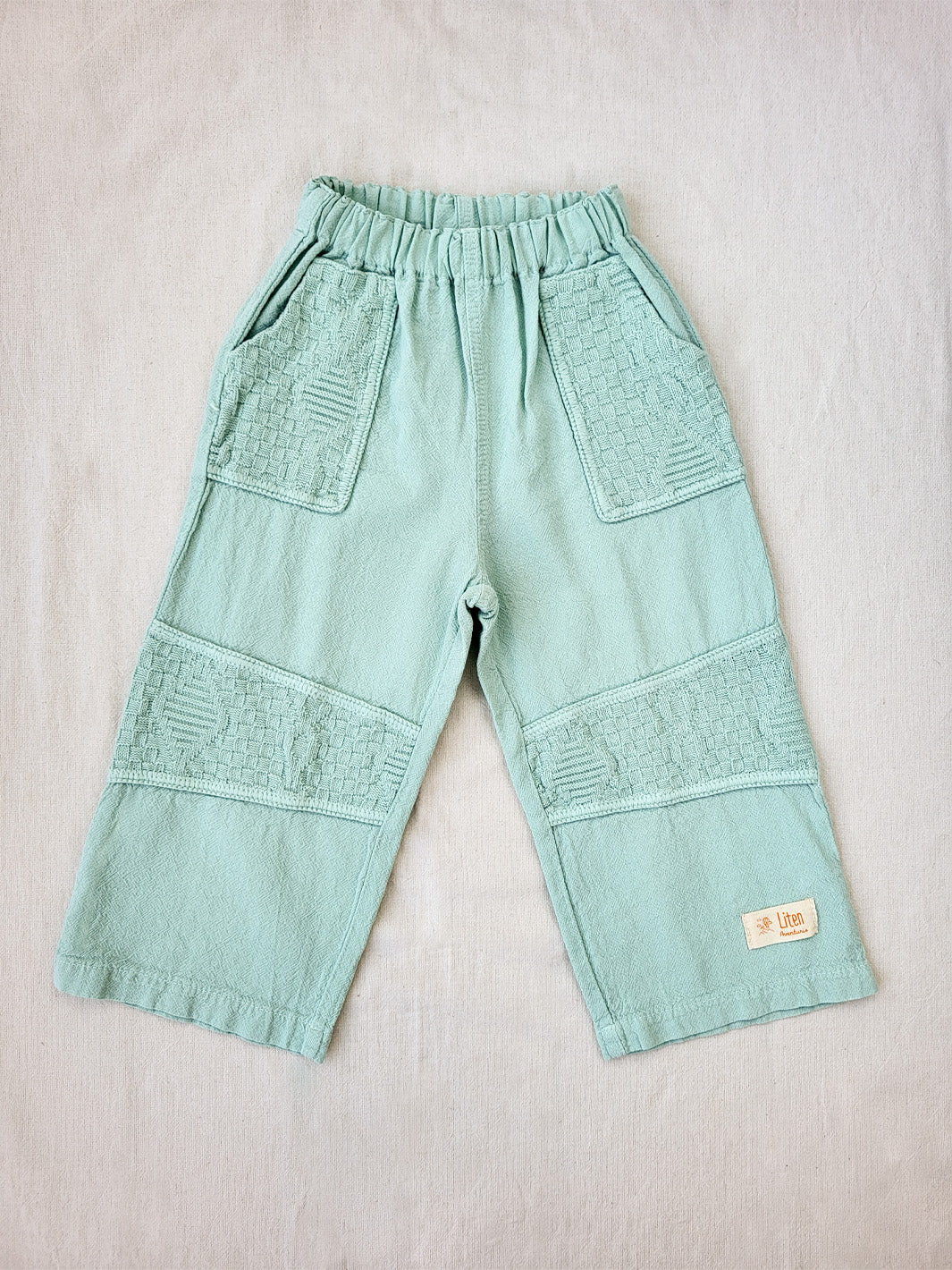  Andy pastel green pants for kids, with knitted cotton patches, excellent for playing outside | Unisex barn byxor i bomull